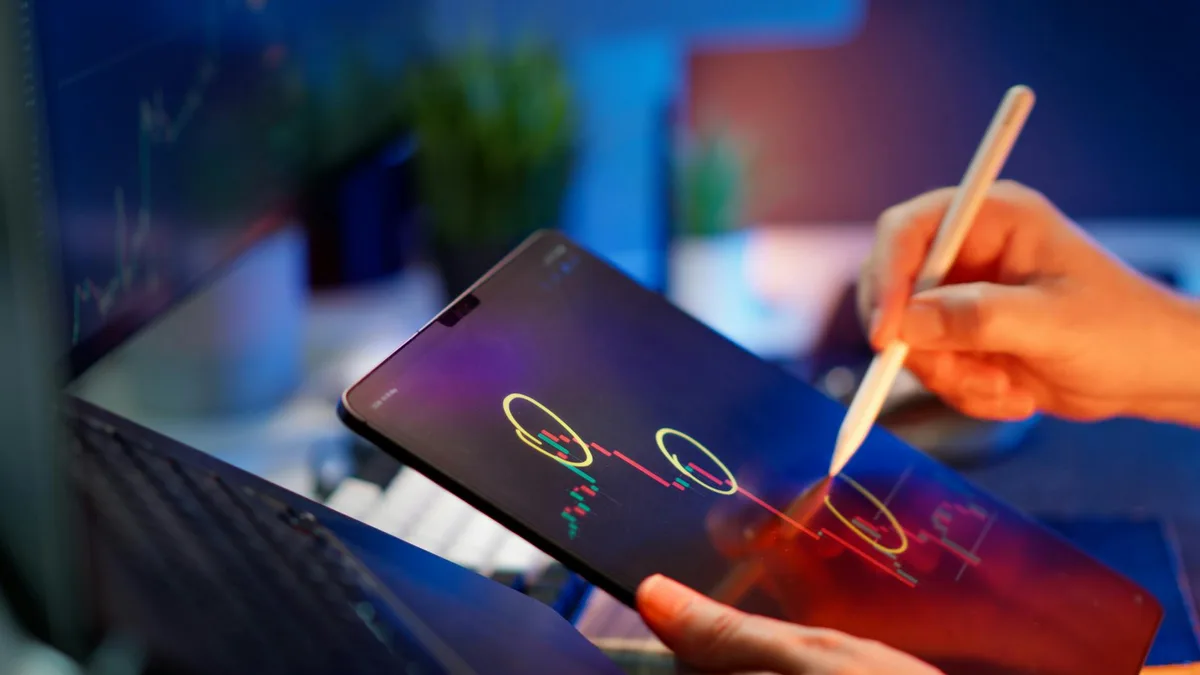 Filipino VA checking ecommerce platform dashboards for Shopee and Lazada on dual monitors